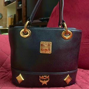 💯 Authentic MCM Leather Bucket bag / Handbag with Gold studded Logo Motifs